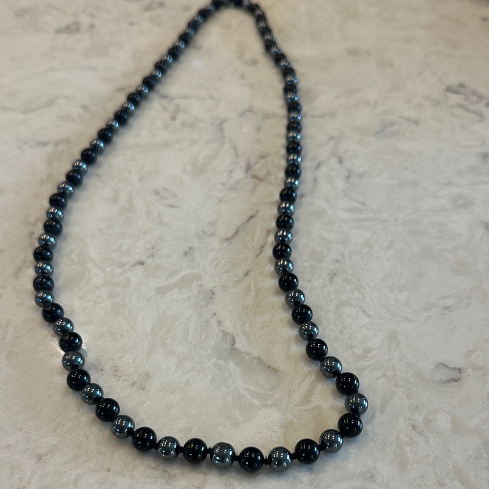 Elegant Black onyx and hematite knotted 32inch lond beaded necklace
